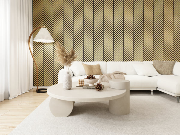 White oak herringbone acoustic wood panels installed as a V-pattern feature wall