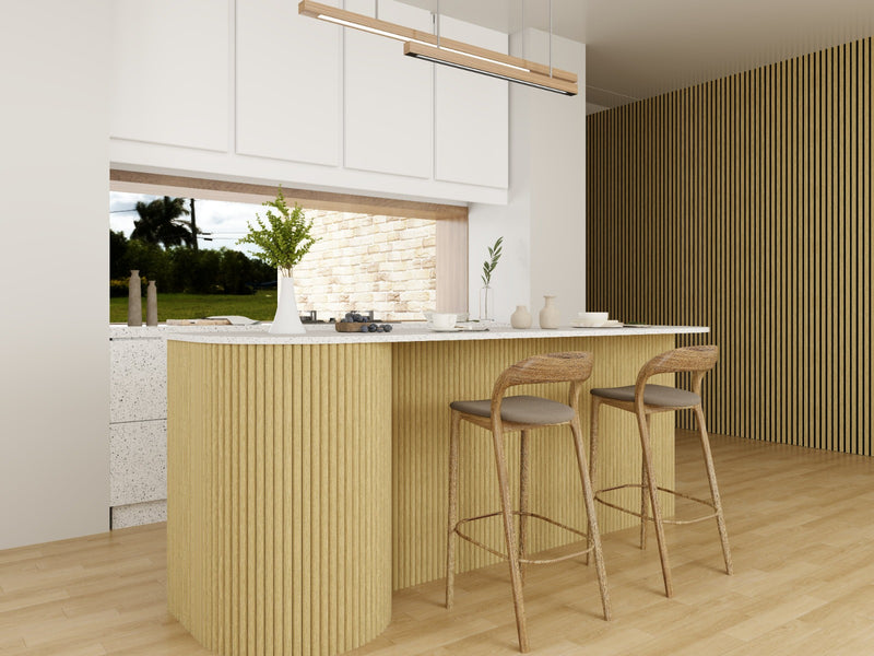 White oak flexible tambour wall panels installed on a curved kitchen island surface